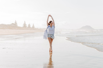 Fototapeta na wymiar woman yoga on the beach