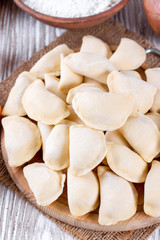 Fototapeta na wymiar Raw dumpling with potatoes. Preparation dumplings