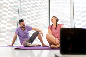 Obraz premium healthy boy and girl couple doing sport indoors bright and white