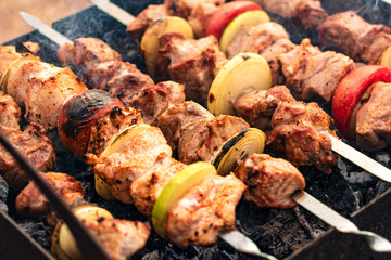 Grilled shish kebab or shashlik on skewers closeup