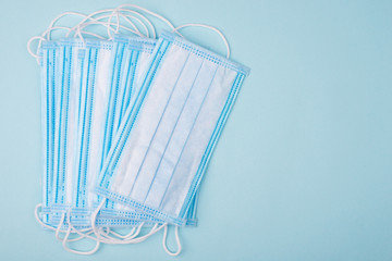 2019-ncov outbreak concept. Top above overhead close up view photo of many lot of medical masks isolated over background with blank place