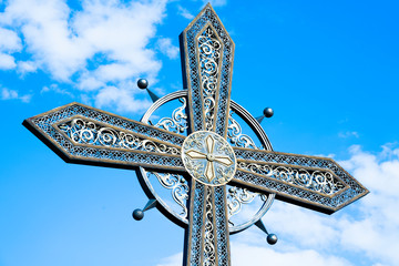 big iron cross against the sky