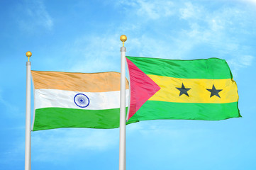 India and Sao Tome and Principe two flags on flagpoles and blue cloudy sky