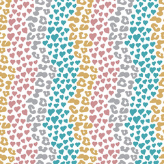 seamless repeat pattern with animal prints and heart shapes