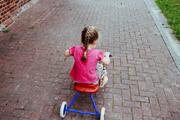 little girl riding 