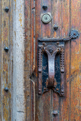 Fototapeta na wymiar Classic door handle lock on historical door, Ghent, Belgium.
