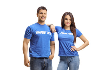 Young volunteers in blue t-shirts posing