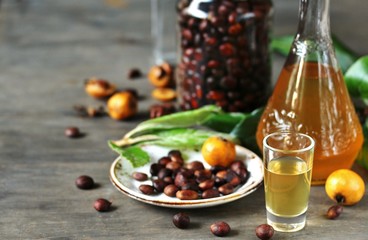 Liqueur nespolino. Loquat seed liquor. tincture alcoholic on bones loquat . Amaretto with almond flavor. recipe for medlar. alcoholic beverage from the  loquat. tincture on seed loquat. 