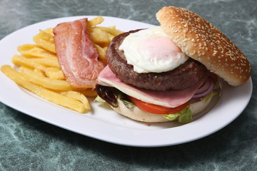 Homemade veal burger with bacon