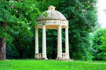 Stone arbor in the park in the Renaissance style.