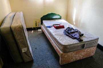 Bedroom in an abandoned hotel