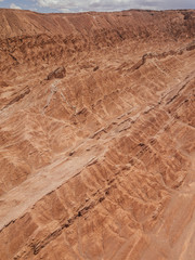 Aerial View Atacama Desert Valle de la Muerte, Death Valley in San Pedro de Atacama, Chile sand hills and rock formations natural wonder by drone