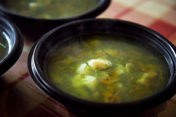 hot soup in a disposable container,for delivery of food at home