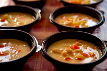 hot soup in a disposable container,for delivery of food at home