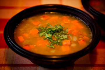 hot soup in a disposable container,for delivery of food at home