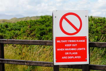 Sign warning people that they are entering a military firing range.