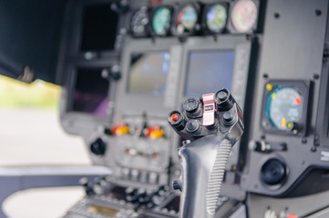 Cyclic stick in the cockpit of a Eurocopter AS350 helicopter