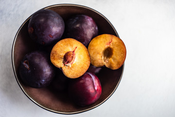 Naklejka na ściany i meble Organic plum fruits