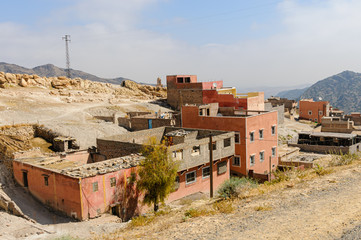 Small mountain Berber village with traditional houses in the Al Haouz Province,...