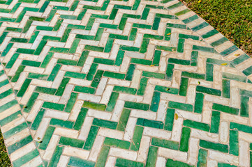 Traditional tiles on a garden path in Marrakech, Morocco