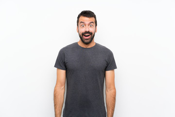 Young handsome man over isolated white background with surprise facial expression