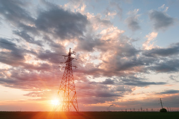 Electrical substation silhouette on the dramatic sunset background