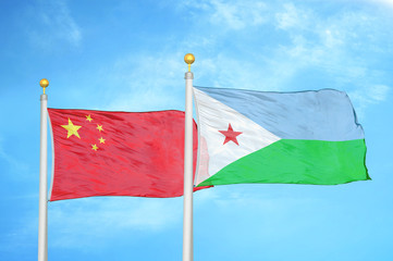 China and Djibouti two flags on flagpoles and blue cloudy sky