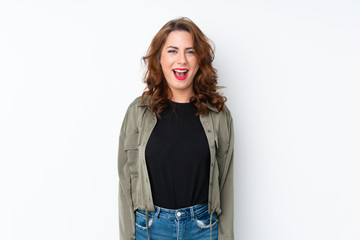 Obraz premium Young Russian woman over isolated white background with surprise facial expression