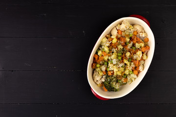 Cooked vegetables salad in the bowl served on the table