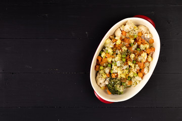 Cooked vegetables salad in the bowl served on the table