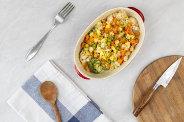 Cooked vegetables salad in the bowl served on the table