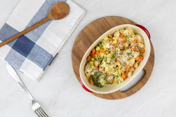 Cooked vegetables salad in the bowl served on the table