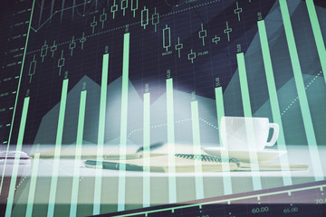 Multi exposure of forex graph drawing and desktop with coffee and items on table background. Concept of financial market trading