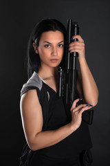Obraz premium sexy woman with gun