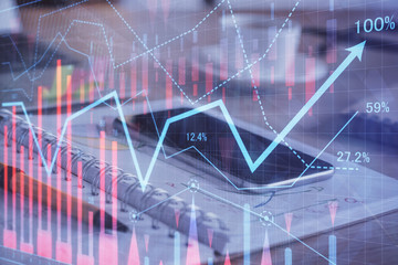 Double exposure of forex chart drawing and cell phone background. Concept of financial data analysis