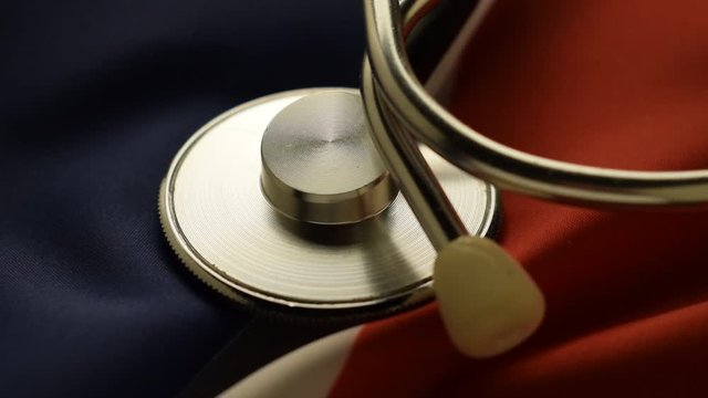 Stethoscope on the flag ft0203_0253 St&eacute;thoscope sur le drapeau