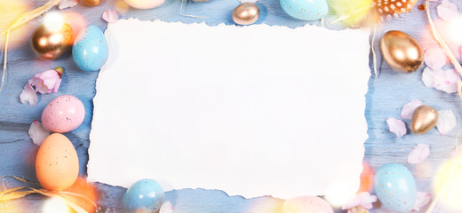 Easter background with Easter eggs and spring flowers