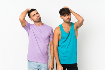 Fototapeta premium Two men over isolated background with an expression of frustration and not understanding