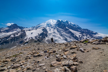 Adventurous man hiking near Mount Rainier.