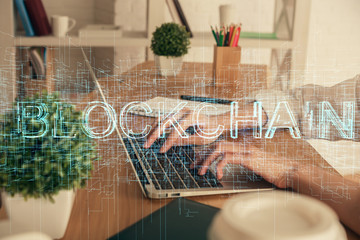 Double exposure of woman hands typing on computer and crypto market theme hologram drawing....