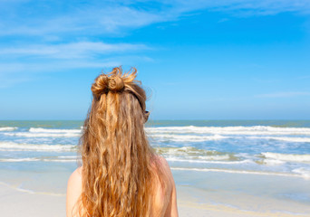 Blond woman on the beach