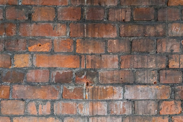 texture old red brick wall laid out at the beginning of the 18th century. Beautiful antique texture