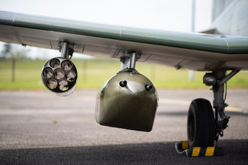 old military plane with rocket luncher