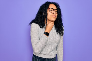 Young african american woman wearing casual sweater and glasses over purple background Touching painful neck, sore throat for flu, clod and infection