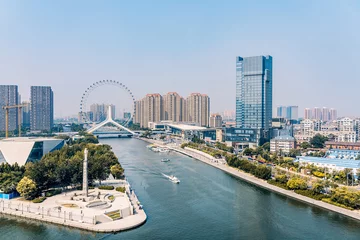 Foto op Aluminium Twilight scenery of Haihe River and Ferris wheel in Tianjin, China  © Govan