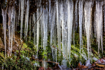 Close up shot of Icicles on a Ledge