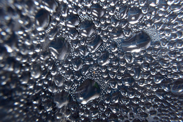Water droplets on black background