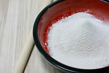bowl of buckwheat flour and rolling pin