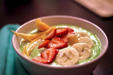 Fresh Yogurt With Sliced Jack Fruit and Berries on top and mint leave