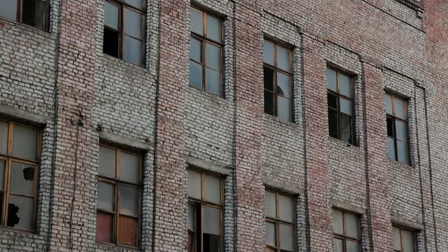 Abandoned building in industrial zone, America's rusty belt, collapsed production, effects of crisis, new economic reality, abandoned factory complex, ruined factory, poor prospects, shabby facade